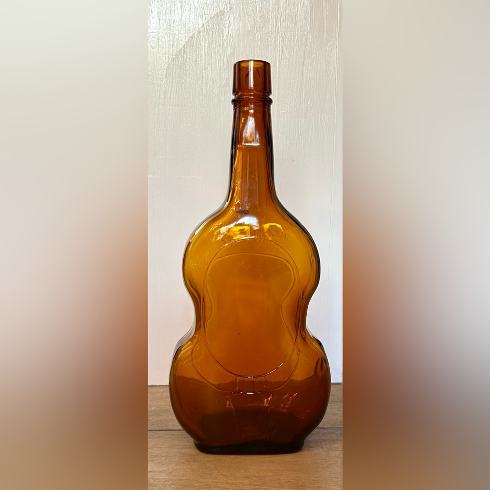 Vintage Owens Illinois Amber glass violin/fiddle shaped bottle.